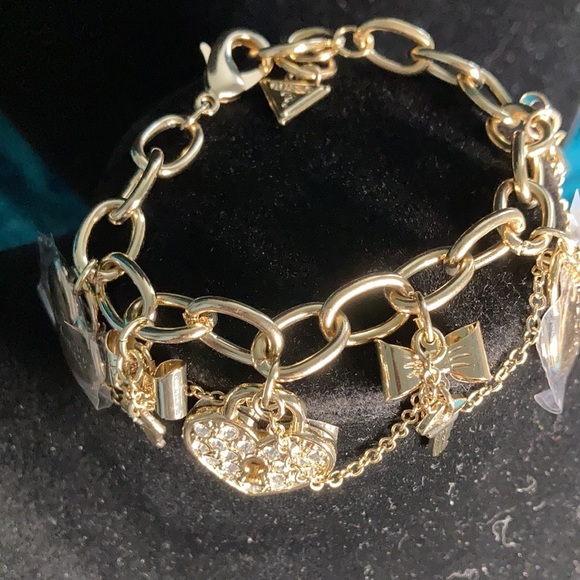 Guess gold tone bracelet with charms - Picture 2 of 4